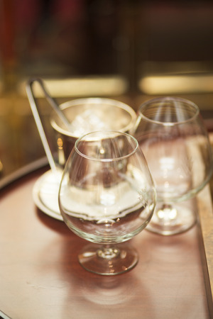 Alcoholic drinks bar with glasses and icebucket luxury five star hotel nightclub in Ibiza Spain.の写真素材