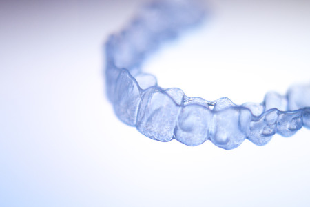 Invisible teeth dental tooth retainer aligner to straighten each tooth in orthodontics treatment for patients.の写真素材