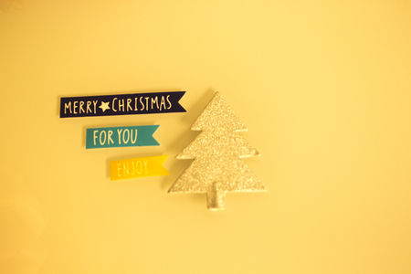 Xmas fir tree decoration miniature model Merry Christmas tag.の写真素材
