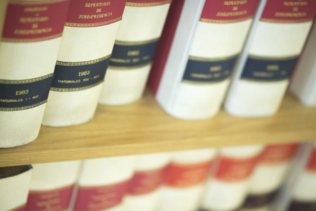 Law firm offices old legal report books on bookshelf. The book models are old and generic and do not require property release.の写真素材