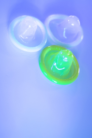 Rubber latex condom male contraceptive for safe disease and pregnancy free sex.の写真素材