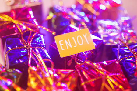 Christmas party celebration presents gift wrapped miniatures Enjoy tag.