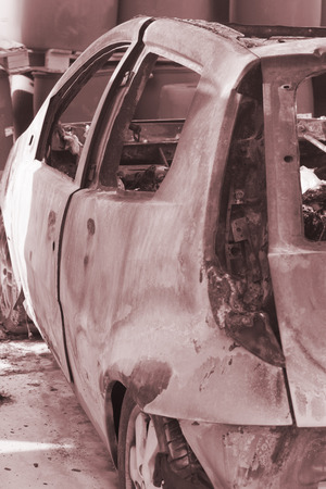 Fire station firefighter training equipment burnt car crash wreck used by fireman to simulate fires drill.の写真素材