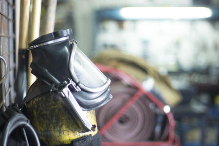 Fire station firefighter training equipment protective uniform used by fireman to fight fires and protect from flames.の写真素材