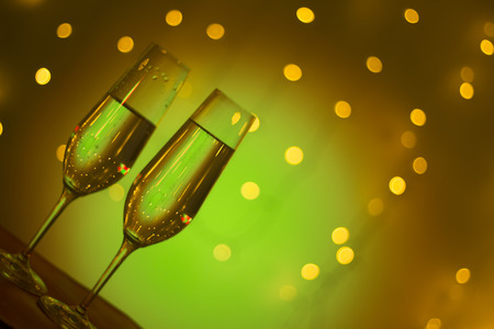 Champagne sparkling wine glass of prosecco cava in discotque party bar during wedding in Ibiza Spain with lights behind.の写真素材