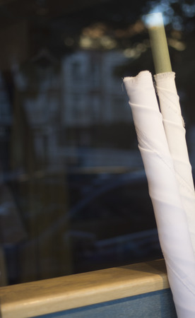 Bridal store hand made dress and hat shop window with accesories for brides.の写真素材