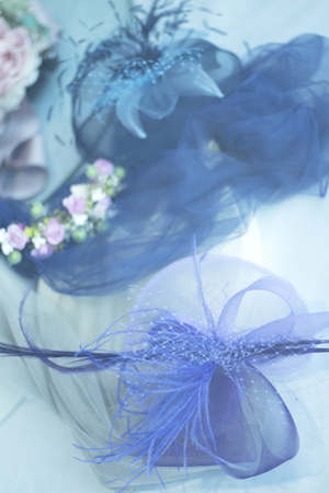 Bridal store hand made dress and hat shop window with accesories for brides.の写真素材