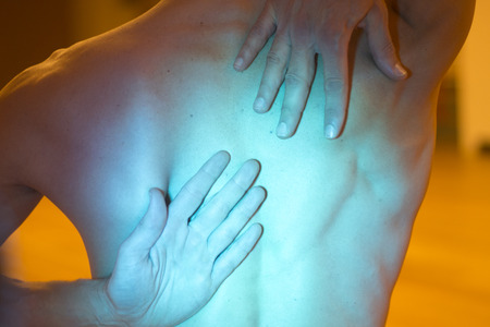 Yoga teacher man doing meditation practice with hand mudra asana.の写真素材