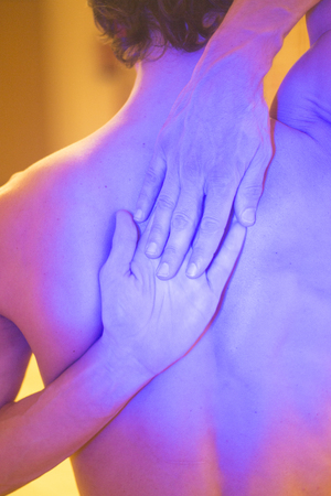 Yoga teacher man doing meditation practice with hand mudra asana.の写真素材