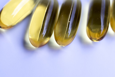 Cod fish liver oil capsules vitamin and mineral health and healthy joint natural supplement.の写真素材