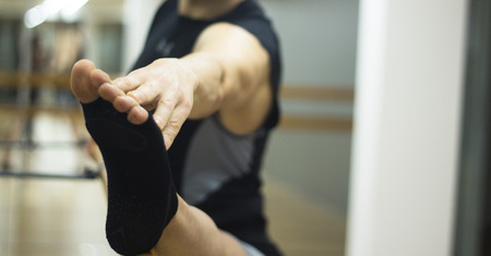 Pilates and ballet fitness stretching and yoga studio gym bar equipment and dancer stretching.の写真素材