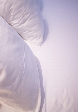 Modern minimalist luxury five star hotel bed cotton sheet and pillow case cover clean ready for guests.のeditorial素材