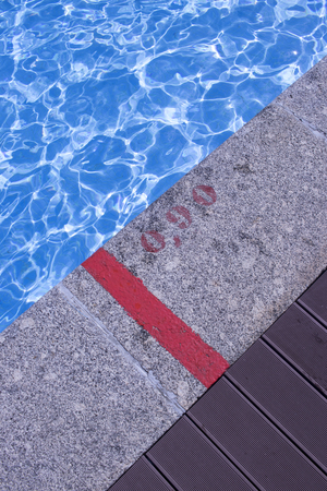 Summer outdoor swimming pool in luxury resort hotel garden.の写真素材