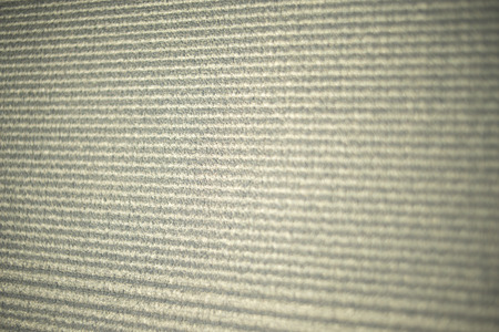 Yoga pilates gym training mat closeup on lines in rubber.