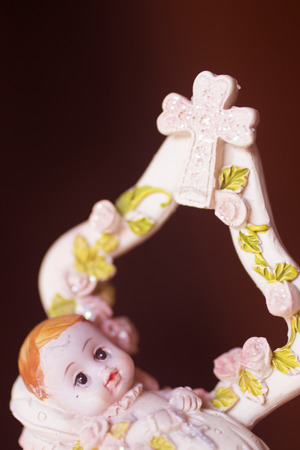 Cake topper Catholic holy baptism christening ceremony religious girl in Christian church.の写真素材