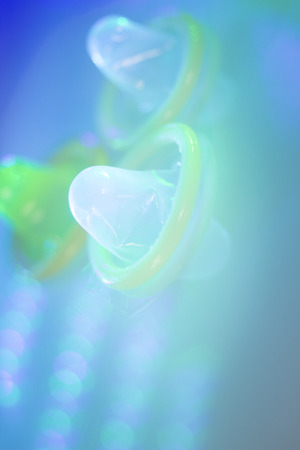 Rubber latex condom male contraceptive for safe disease and pregnancy free sex.の写真素材