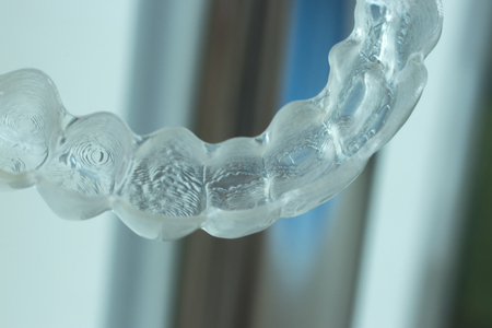 Invisible clear dental teeth aligner straighteners for orthodontic dentists treatment as modern aesthetic brackets.の写真素材