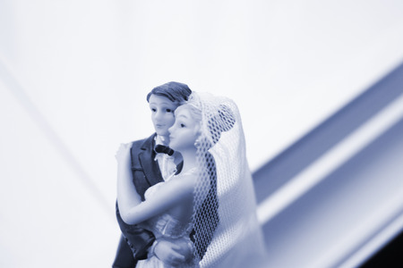 Cake topper bride and groom wedding couple of holding romantic marriage embrace of  love.の写真素材