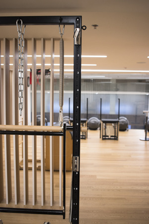 Pilates machine fitness studio gym room with training machinesの写真素材