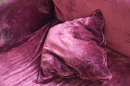 Velvet velours luxury fabric designer sofa arm chair with cushions.の写真素材