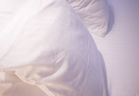 Modern minimalist luxury five star hotel bed cotton sheet and pillow case cover clean ready for guests.の写真素材
