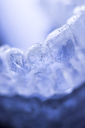 Invisible dental teeth aligners brackets used to align each tooth in cosmetic dentistry for...