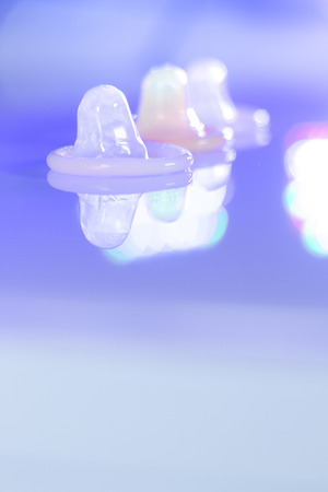 Rubber latex condom male contraceptive for safe disease and pregnancy free sex.の写真素材