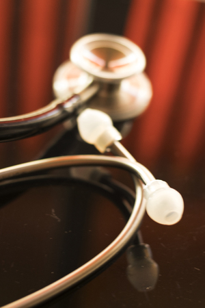 Doctors medical stethoscope used by doctor o nurse to listen to patient heartbeat in hospital.の写真素材