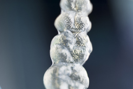 Invisible dental teeth aligners brackets used to align each tooth in cosmetic dentistry for patients.の写真素材