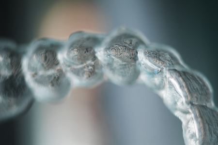 Invisible dental teeth aligners brackets used to align each tooth in cosmetic dentistry for...