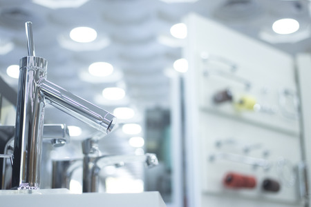 Bathroom tap sink showroom display of new design option for home building improvement works.の写真素材