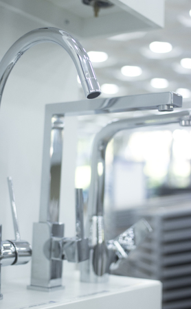 Bathroom tap sink showroom display of new design option for home building improvement works.の写真素材