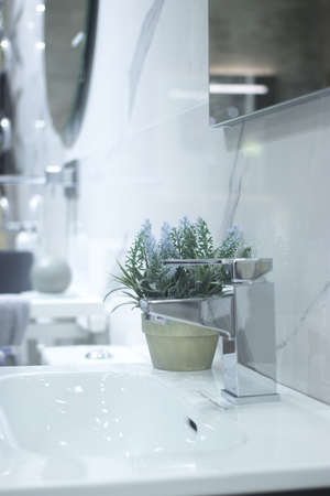 Bathroom tap sink showroom display of new design option for home building improvement works.の写真素材