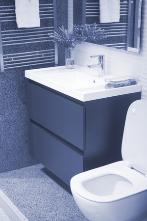 Bathroom showroom display of new sink chrome tap design option for home building improvement works.の写真素材