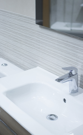 Bathroom tap sink showroom display of new design option for home building improvement works.の写真素材