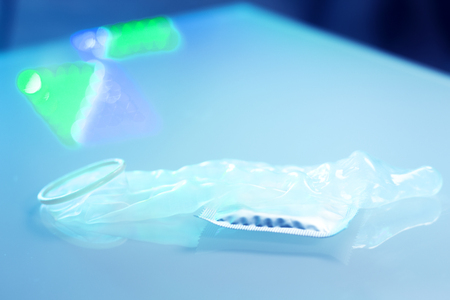 Rubber latex condom male contraceptive for safe disease and pregnancy free sex.の写真素材