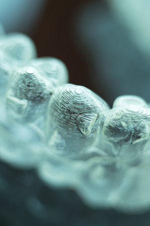 Invisible dental teeth aligners brackets used to align each tooth in cosmetic dentistry for...