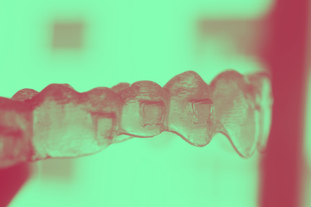 Invisible plastic bracket teeth dental aligner orthodontic straighteners.の写真素材