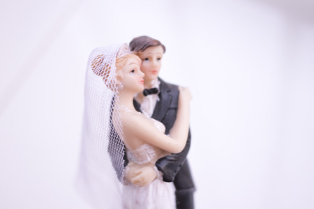 Cake topper bride and groom wedding couple of holding romantic marriage embrace of  love.