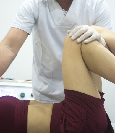 Physiotherapy clinic osteopathy physiotherapist treatment of patient injury chiropractic rehabilitation therapy.の写真素材