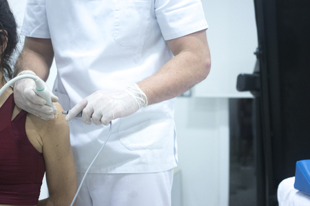 Physiotherapy clinic Intratissue Percutaneous Electrolysis EPI dry needling physiotherapist patient injury.の写真素材