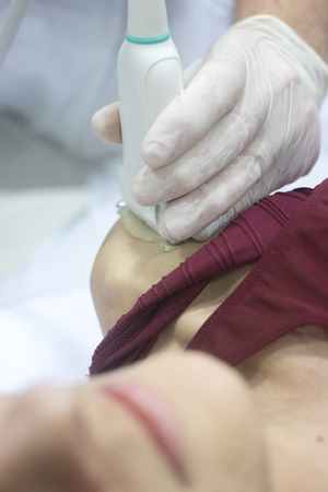 Physiotherapy clinic Intratissue Percutaneous Electrolysis EPI dry needling physiotherapist patient injury.の写真素材