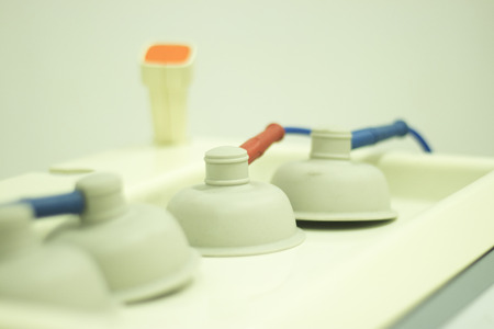 Physiotherapy electrostimulation equipment in physiotherapist medical clinic.