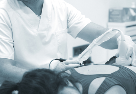 Physiotherapy clinic Intratissue Percutaneous Electrolysis EPI dry needling physiotherapist patient injury.の写真素材