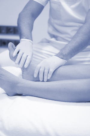 Physiotherapy clinic Intratissue Percutaneous Electrolysis EPI dry needling physiotherapist patient injury.の写真素材