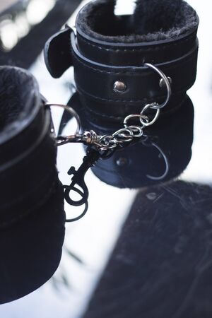 Leather bondage s&m handcuff restraints for kinky adult sexy domination games.の写真素材