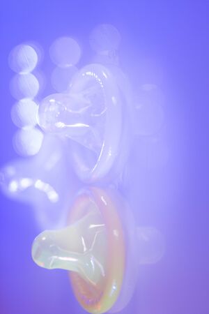 Rubber latex condom male contraceptive for safe disease and pregnancy free sex.の写真素材