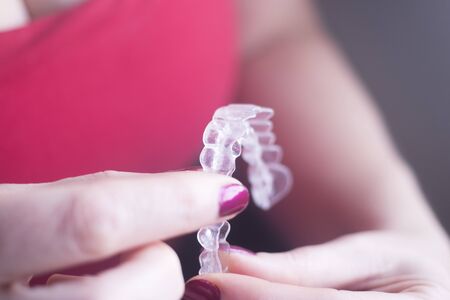Clear dental teeth retainer brackets to straighten and align each tooth in modern dentistry...