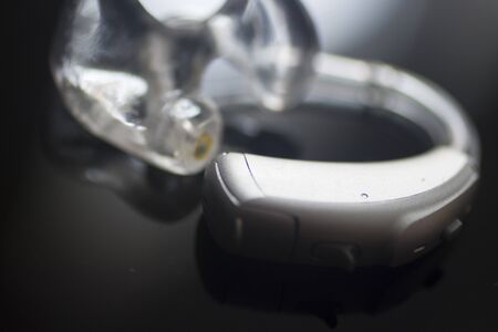 Modern digital hearing aid for deafness and deaf people.