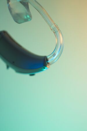 Modern digital hearing aid for deafness and deaf people.